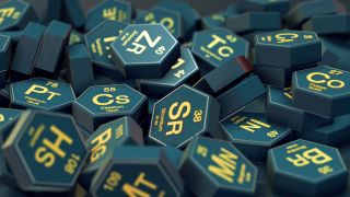 Close up view of a pile of hexagons with chemical elements symbols (3d render)